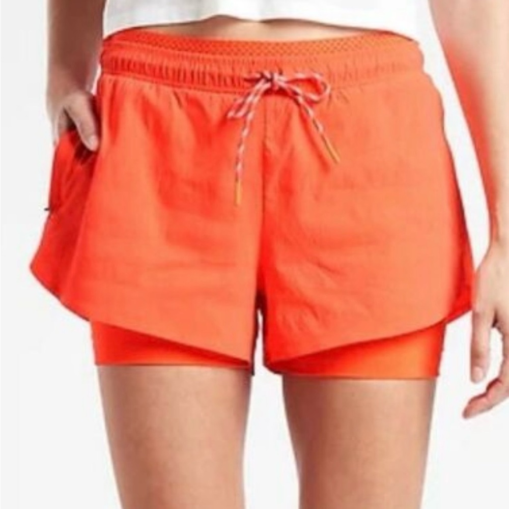 Athleta orange crest 2 in 1 shortie size 12